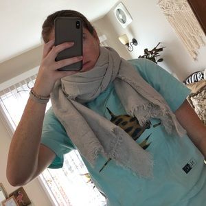Lighter grey colored scarf